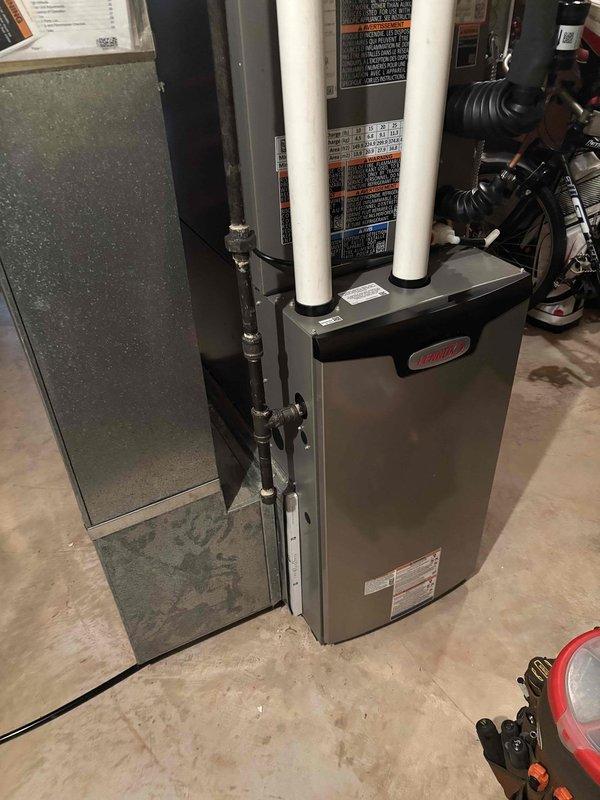 Responded to no-heat callback service call. Inspected Lennox furnace that customer reported was taking excessive time to initiate heating cycle after recent installation. Diagnostic testing with manometer showed gas pressure reading of 11.1 inH2O, which was verified to be within manufacturer specifications. System is now operating normally with proper ignition sequence and heat output.