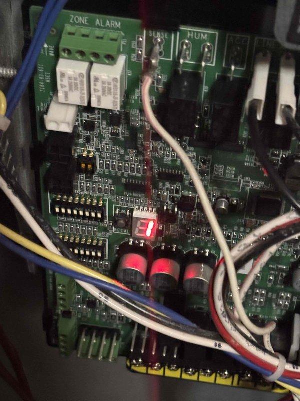 Resolved intermittent operation issue on Lennox heat pump system by replacing defective control board (part #27P17). Inspected and adjusted chassis ground connection by loosening screws for proper alignment. Educated customer on normal heat pump operation characteristics relative to outdoor temperature conditions.