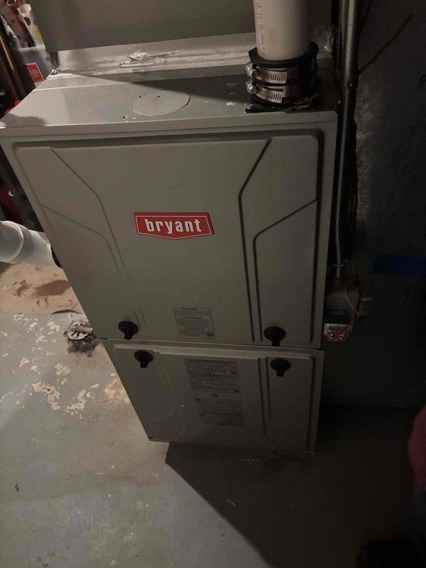 Performed comprehensive tune-up service on Bryant furnace system. Conducted electrical diagnostic testing with multimeters showing normal readings (55). All components inspected with no issues found; system operating within manufacturer specifications.