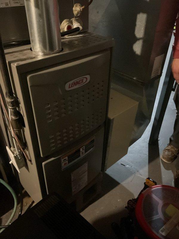 Performed annual heating maintenance on Lennox furnace located in basement. Measured combustion efficiency with digital analyzer, reading 273 at time of service. Adjusted dehumidification settings per customer concern about excessive dryness in home. All systems operating within normal parameters after service.