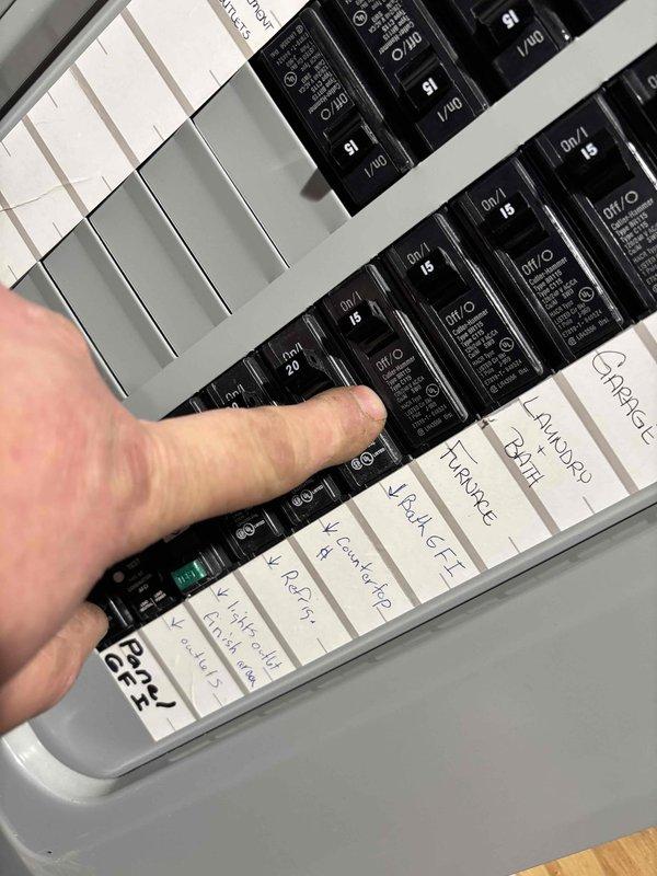 Responded to emergency service call for customer with newborn reporting furnace not heating, making noise with blinking red light (unit operating at 65°F despite 69°F setting). Discovered tripped circuit breaker at panel (circuit #20) and restored power. Found significant ice buildup on evaporator coil/heat exchange system causing restricted airflow. Reset system, thawed ice formation, and verified proper operation to restore heat to residence.