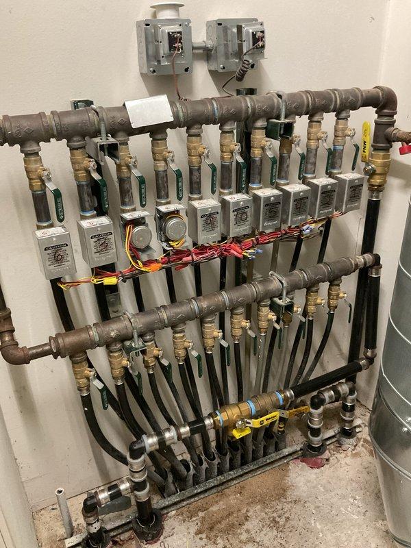 Diagnosed insufficient hot water issue in K2 water heating system. Found failed circulator pump and malfunctioning tempering valve. Removed existing Bell & Gossett circulator pump and installed new replacement unit. Replaced tempering valve to restore proper water temperature regulation. System now operating at correct parameters with proper circulation and temperature control.