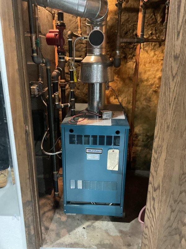 Replaced defective pop top zone valve on Kenmore boiler system. Installation completed successfully with customer-supplied parts. System functioning normally with proper circulation through the newly installed zone valve.