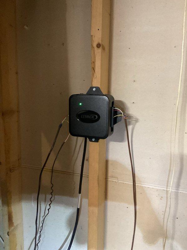 Replaced defective control board in Lennox HVAC system. Successfully installed new RDS and TS boards with proper wiring connections. System operational with indicator light showing normal function after installation.