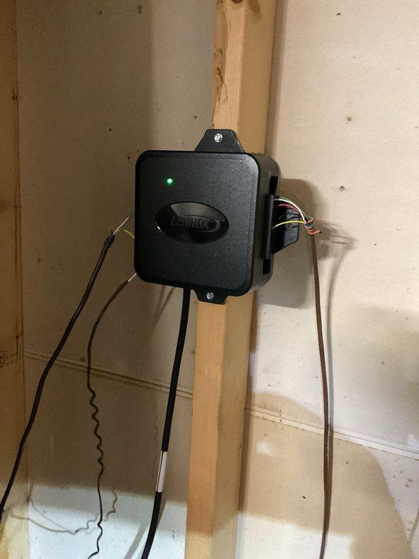 Replaced defective control board in Lennox HVAC system. Successfully installed new RDS and TS boards with proper wiring connections. System operational with indicator light showing normal function after installation.