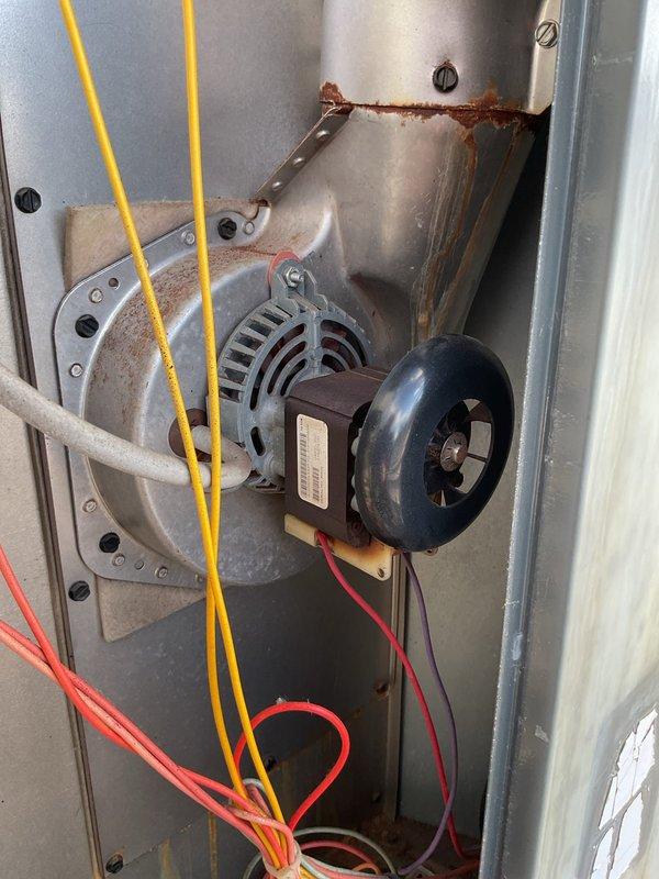 Responded to no-heat complaint at customer location. Diagnosed Goodman rooftop unit and identified failed inducer motor as the root cause. Motor showed significant corrosion and wear. Parts ordered for replacement upon arrival.