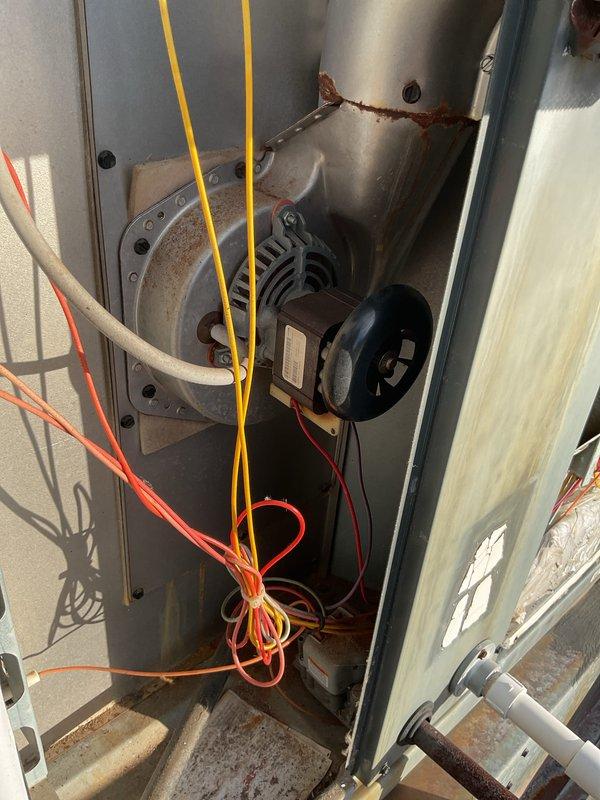 Responded to no-heat complaint at customer location. Diagnosed Goodman rooftop unit and identified failed inducer motor as the root cause. Motor showed significant corrosion and wear. Parts ordered for replacement upon arrival.
