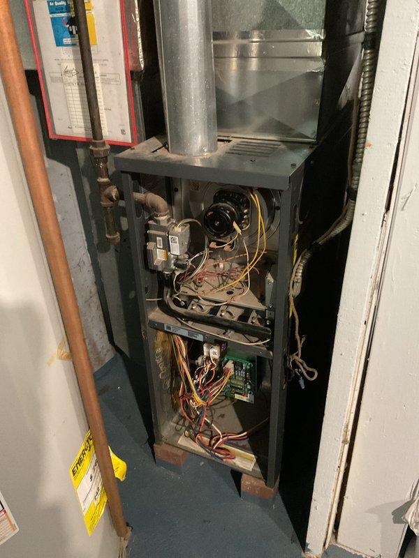 Responded to no heat call for a Goodman system where customer reported unit blowing cold air with temperature at 64°F despite thermostat set to 73°F. Performed diagnostic inspection of furnace, identifying faulty ignition sequence preventing proper heating cycle. Cleaned flame sensor and verified proper operation of limit switches. System now operating correctly with consistent heat output and normal temperature differential.