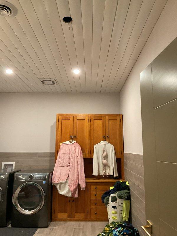 Inspected dryer ventilation system that was improperly venting into basement. Evaluated existing ductwork path, which required approximately 30 feet of vertical run through brick/stucco construction. Installed proper exterior venting system to ensure safe exhaust discharge and prevent moisture accumulation in the basement area.