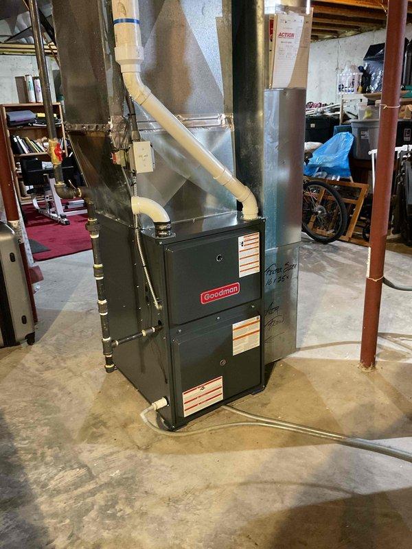 Performed warranty service replacing Goodman LP furnace with new unit. Reused existing LP kit and stainless burners during installation. Completed installation in basement with proper venting and ductwork connections.