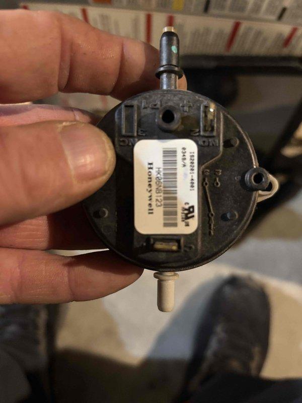 Responded to no-heat call for furnace that had stopped operating while customer was away from home. Diagnosed failed pressure switch on Carrier unit. Removed defective component and ordered OEM temperature switch for replacement. System will require follow-up service once part arrives.