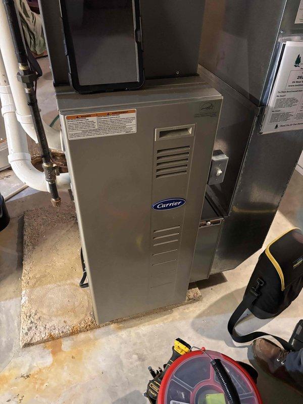 Responded to no-heat call for furnace that had stopped operating while customer was away from home. Diagnosed failed pressure switch on Carrier unit. Removed defective component and ordered OEM temperature switch for replacement. System will require follow-up service once part arrives.
