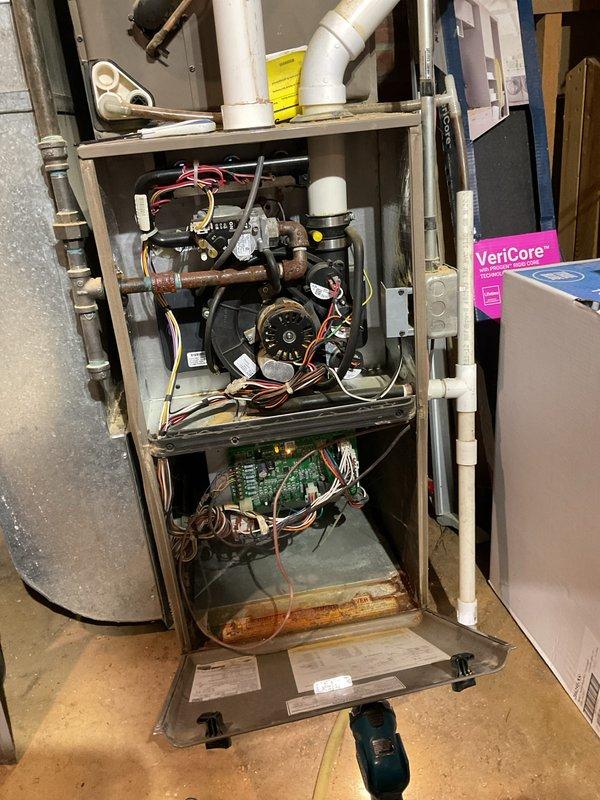 Responded to a call regarding insufficient heat where the system was not keeping up with demand and blower appeared to operate intermittently. Upon inspection, removed front panel to access internal components and examined the blower motor, control board, gas valve assembly, and wiring connections. Installed new air filter to replace existing unit. System was tested and proper operation was restored, resolving the heating performance issue.