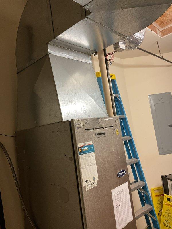 Responded to service call for a Carrier furnace with insufficient heating. Diagnostic inspection revealed a compromised heat exchanger preventing the unit from reaching setpoint temperature (65°F measured vs. 80°F set). Documented condition with photos of the air register showing poor airflow and the furnace installation. Customer advised of need for furnace replacement due to safety concerns with the failed heat exchanger.