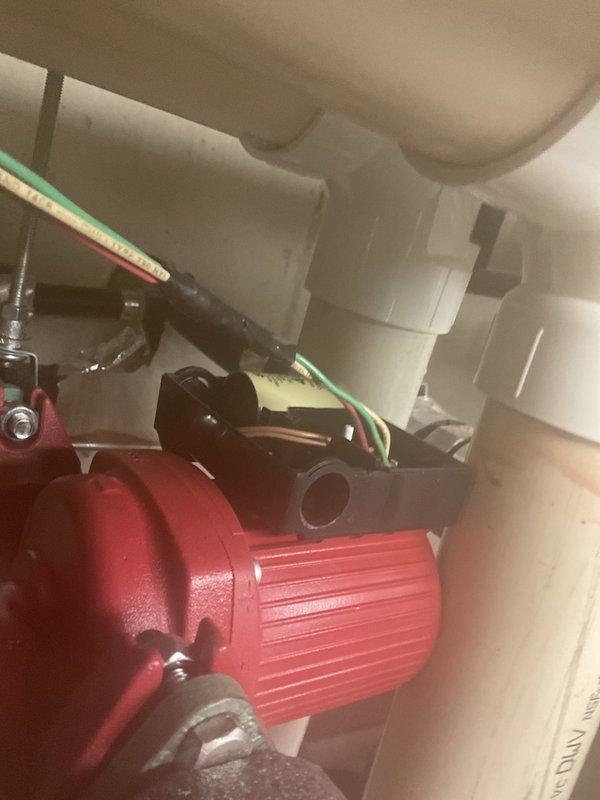 Corrected pump installation by reversing flow direction. Pump was initially installed with incorrect orientation, causing heating failure. Physically rotated pump assembly to establish proper flow direction, successfully restoring heating function to the boiler system.