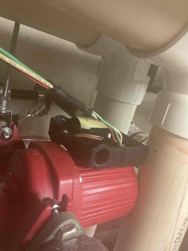 Corrected pump installation by reversing flow direction. Pump was initially installed with incorrect orientation, causing heating failure. Physically rotated pump assembly to establish proper flow direction, successfully restoring heating function to the boiler system.