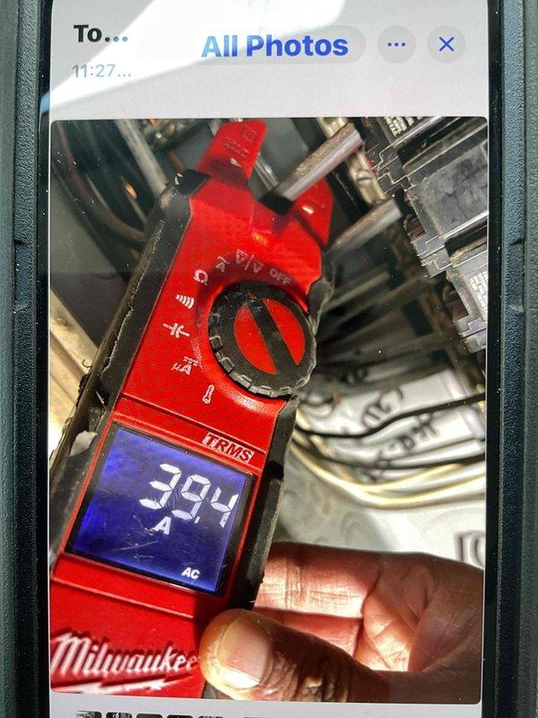 Responded to no-heat call for 30-year-old furnace system. Diagnostic testing revealed blown breaker and excessive amperage draw (394 AC) on blower motor. Thermostat functioning but system unable to maintain temperature (49°F actual vs 60°F setpoint). Determined blower motor failure; recommended system replacement rather than repair due to unit age and component failure.