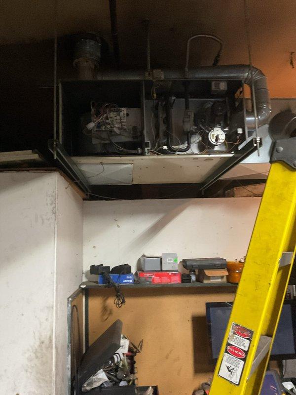 Responded to no-heat call for Spanish-speaking customer. Diagnosed faulty fan control board outputting only 9V. Replaced control board (sourced from AUESTEEL) and installed new thermostat, restoring proper furnace operation and heat function.