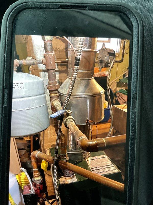 Responded to service call for non-operational boiler. Diagnosed issue with tarnished wires at thermostat connection. Cleaned corroded thermostat wires and cycled unit multiple times to verify proper operation was restored.