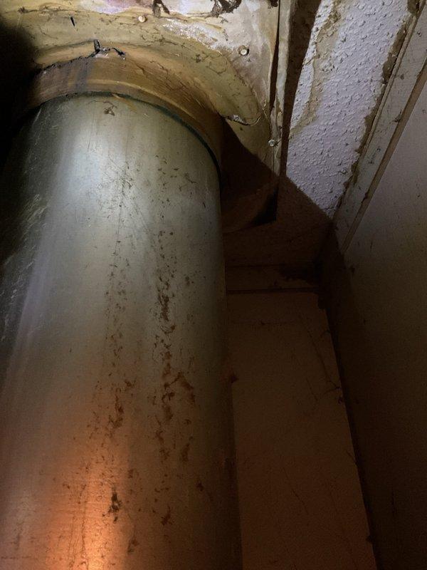 Responded to no-heat call for 25+ year-old mobile home furnace. Diagnostic inspection revealed faulty inducer motor as the source of system failure. Successfully restored temporary operation of the motor, allowing heat function to resume. Noted significant age of unit and visible corrosion on exhaust components that may require future attention.