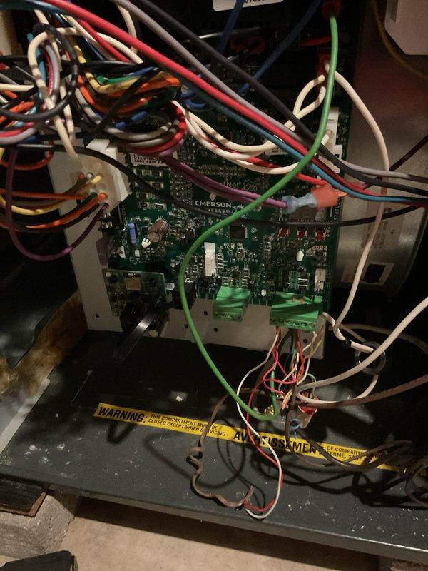 Diagnosed Goodman gas furnace with no heat issue. Visual inspection revealed faulty control board. Sourced and installed replacement Emerson control board, reconnected all electrical terminals, and verified proper operation. System is now functioning correctly with heat restored.