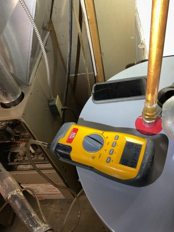 Responded to customer complaint of strong chemical odor emanating from furnace. Performed diagnostic inspection and identified air freshener in return air as source of odor. Completed standard clean and check service on 10+ year old unit, including inspection of internal components which showed normal dust accumulation. Tested system operation with diagnostic equipment to verify proper functionality.