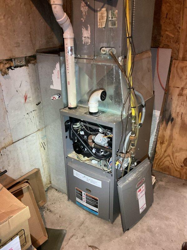 Performed diagnostic service on 2013 Lennox furnace system not maintaining temperature (57°F with thermostat set to 90°F). Conducted basic clean and check maintenance, including inspection of internal components, wiring, motor, and control board. System appears properly installed with appropriate gas connections and ventilation. Recommended further monitoring of heating performance.