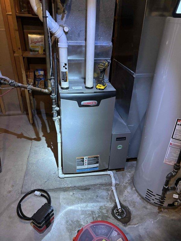 Diagnosed no heat issue on 2017 Lennox furnace. Discovered chipmunk obstruction in PVC intake pipe and faulty pressure switch. Removed animal debris from intake system and replaced defective pressure switch, restoring normal furnace operation and proper combustion pressure readings.