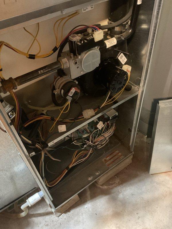 Responded to customer complaint of unusual odor and no heat from 2014 Ameristar furnace. Diagnosed bad blower motor causing system failure. Replaced defective motor assembly, cleaned interior components, and verified proper operation with successful test cycle. Unit now functioning normally with no odor present.