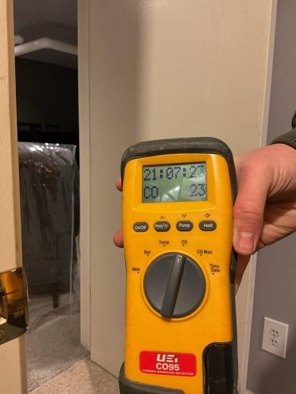 Responded to emergency no-heat call for 20-year-old residential furnace system. Diagnostic testing with UEi CO95 Carbon Monoxide Detector revealed unsafe CO levels of 23 PPM in the home. Upon inspection of the aging furnace and Space-gard air cleaner system, determined unit had failed beyond repair. Recommended replacement with new furnace to restore safe heating function.