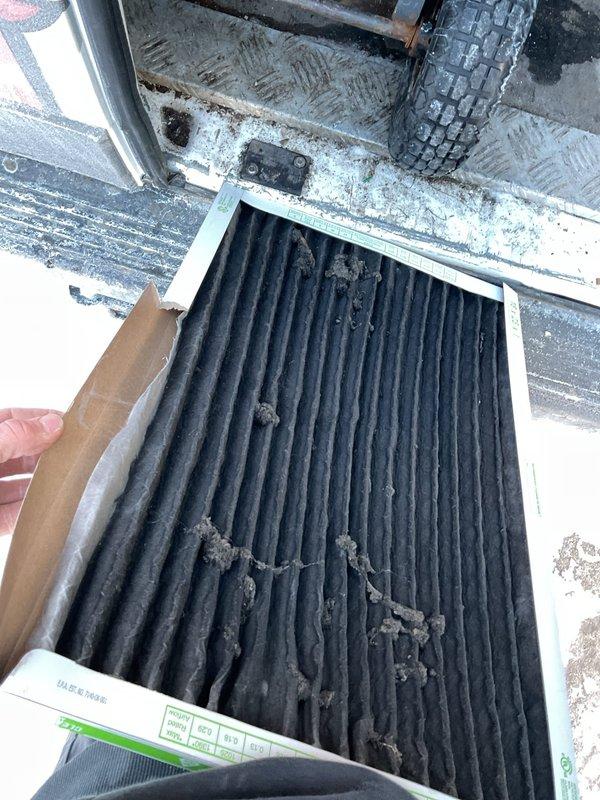 Responded to customer complaint of no heat with system attempting to start but failing. Diagnostic inspection revealed severely clogged air filter causing restricted airflow, which was triggering safety shutdown. Removed and replaced filter with new unit to restore proper system airflow. Unit successfully tested after service with normal operation and heat production resumed.