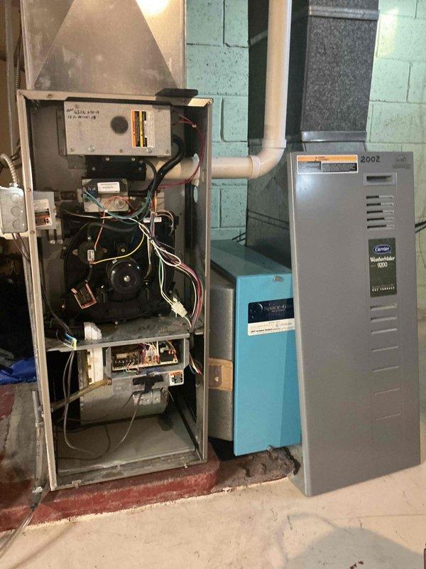 Responded to service call regarding furnace noise and heating concerns. Upon inspection, found Carrier WeatherMaker 8000/Infinity 80 (2002 model) operating but producing excessive vibration. Determined furnace is functional but likely undersized for the recently modified ductwork, causing operational noise. Recommended new furnace installation to properly match current system requirements.