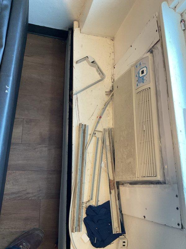 Responded to no heat complaint in room 002. Discovered dual issues: plugged toilet and frozen baseboard heating system. Extracted foreign object (toothbrush) from toilet restoring functionality. Verified zone valve operation and proper valve positions on heating system. Determined baseboards had frozen due to air conditioner operation in basement and upper floor. Deployed temporary heaters to thaw frozen baseboard piping.