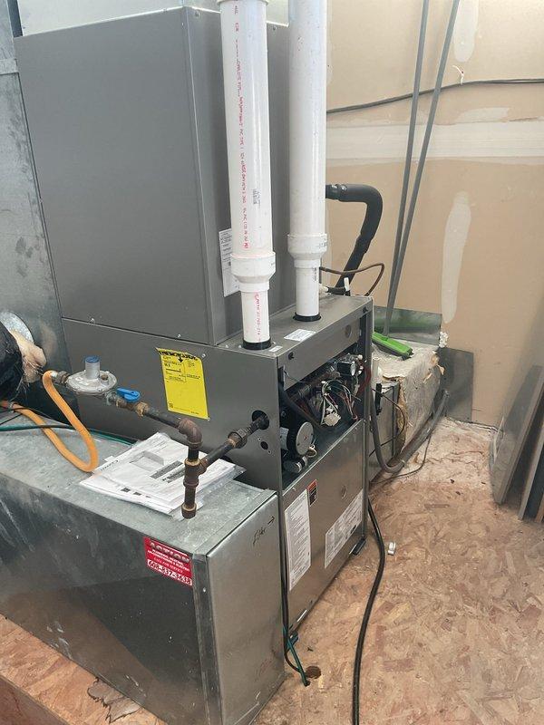 Responded to service call for temperature fluctuations in Rhyme Time Classroom. Thermostat was set to 70°F but temperature was swinging between 66-70°F with no heat output. Diagnosed faulty thermostat and replaced unit to restore proper system operation.