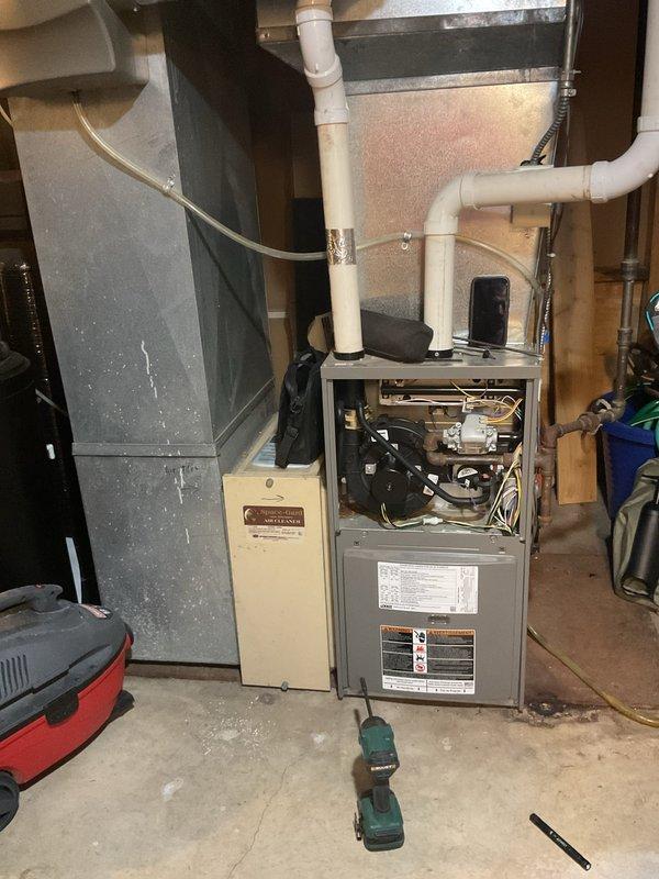 Completed diagnostic assessment on 10-year-old Lennox furnace not heating properly. Inspection revealed signs of corrosion on copper pipes and aging components in the gas valve assembly. Serviced the unit by cleaning connections and verifying proper operation of the recently replaced thermostat to restore adequate heating function.