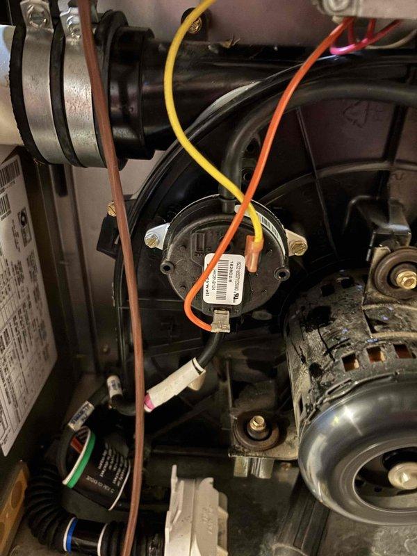 Performed diagnostics on 21-year-old furnace with elevated CO levels (87 PPM) and replaced faulty pressure switch to restore proper operation. System requires monitoring as equipment age presents reliability concerns.