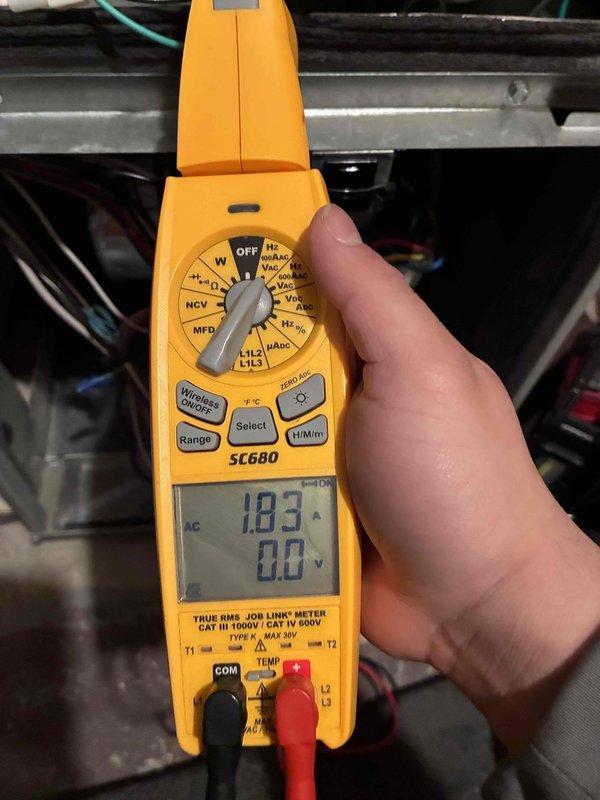 Performed scheduled heating maintenance tune-up on Trane XR86 furnace system with attached Space-Gard 20x25x5 air cleaner. Inspected electrical components with SC680 clamp meter showing 18.3A current draw during operation, which is within normal parameters. Verified filter was in good condition and system is functioning properly for the heating season.