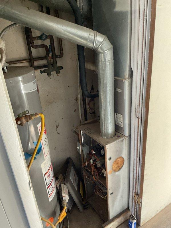 Replaced non-functional blower motor and inducer motor in heating system. Visual inspection confirmed motor failures with visible wear and corrosion on components. Also replaced thermostat as part of comprehensive system repair to restore heat functionality and eliminate abnormal noise from motor assembly.