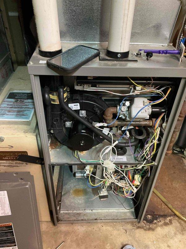 Replaced defective control board and failed high limit switch on furnace to restore proper system operation. Visual inspection of internal components showed normal operational wear. All connections were verified and system functionality was confirmed after repair.