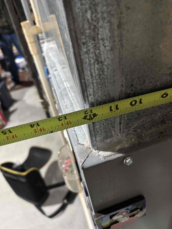 Responded to no-heat call for 10+ year old furnace. Upon inspection, found system non-operational with house temperature at 50°F. Assessed and tagged gas valve out of service due to critical safety issues. Took measurements of existing ductwork to prepare for replacement system as repair not feasible due to equipment age and condition. Provided homeowner with new furnace quote as recommended solution.