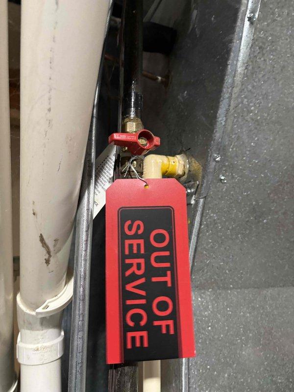 Responded to no-heat call for 10+ year old furnace. Upon inspection, found system non-operational with house temperature at 50°F. Assessed and tagged gas valve out of service due to critical safety issues. Took measurements of existing ductwork to prepare for replacement system as repair not feasible due to equipment age and condition. Provided homeowner with new furnace quote as recommended solution.