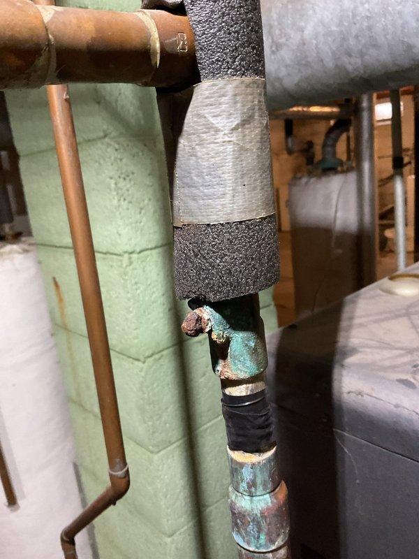 Responded to no heat call for zone four apartment. Diagnosed faulty Grundfos UP 15-42F circulating pump showing erratic current readings and poor performance. Replaced pump and severely deteriorated shut off valve. System had significant copper pipe corrosion requiring careful service to maintain system integrity.