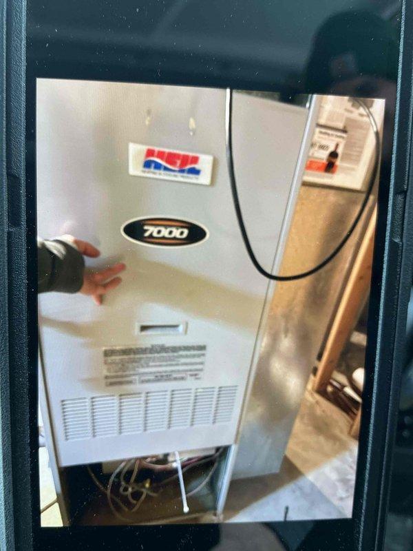 Performed emergency diagnostic service on Heil 7000 furnace. Inspection revealed severe rust formation and critical cracks in heat exchanger. System exhibited ignition failure and carbon monoxide readings exceeded 100 ppm - unsafe operating conditions. Recommended complete furnace replacement due to compromised heat exchanger integrity and carbon monoxide hazard.