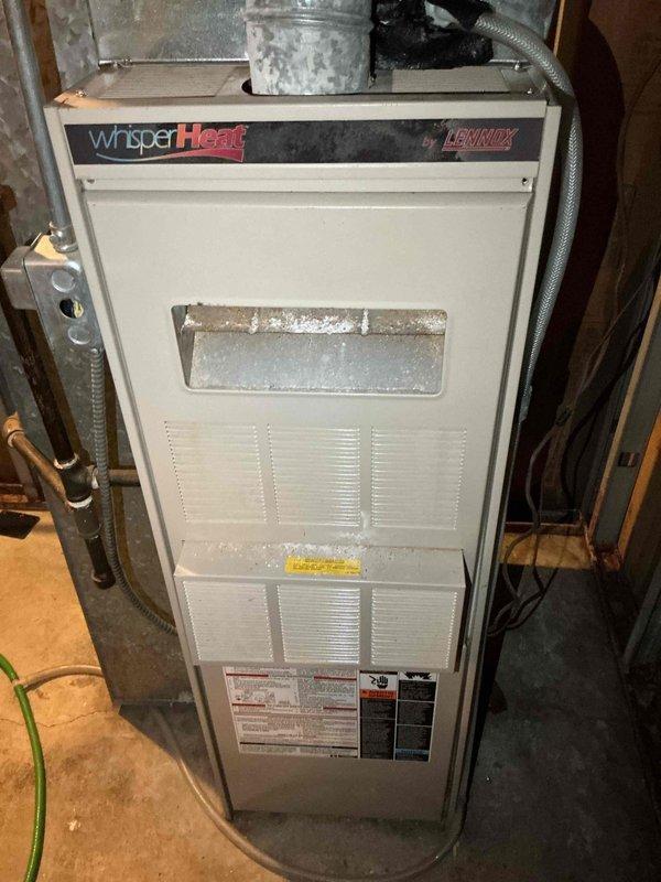 Responded to service call regarding Lennox WhisperHeat furnace producing banging noise during startup. Performed diagnostic inspection, accessed internal components to examine for potential causes of intermittent banging. Completed full system cleaning and operational check - all systems functioning properly at time of service. Noted secondary furnace may require replacement in future.