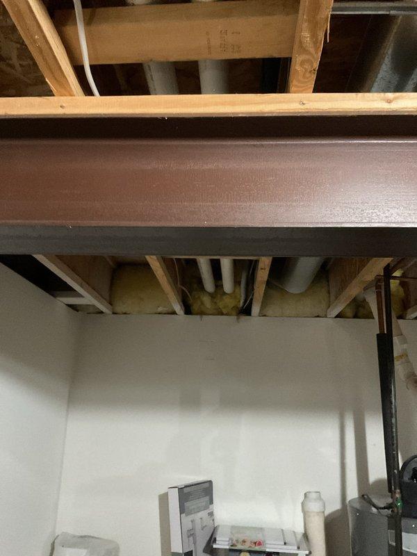 Responded to no-heat call where customer reported non-functional thermostat. Diagnostic inspection revealed multiple system failures including compromised combustion air intake, malfunctioning blower motor, and failed thermostat. Observed significant water damage in basement area near HVAC equipment. Provided customer with replacement options after determining extensive repairs would be needed.