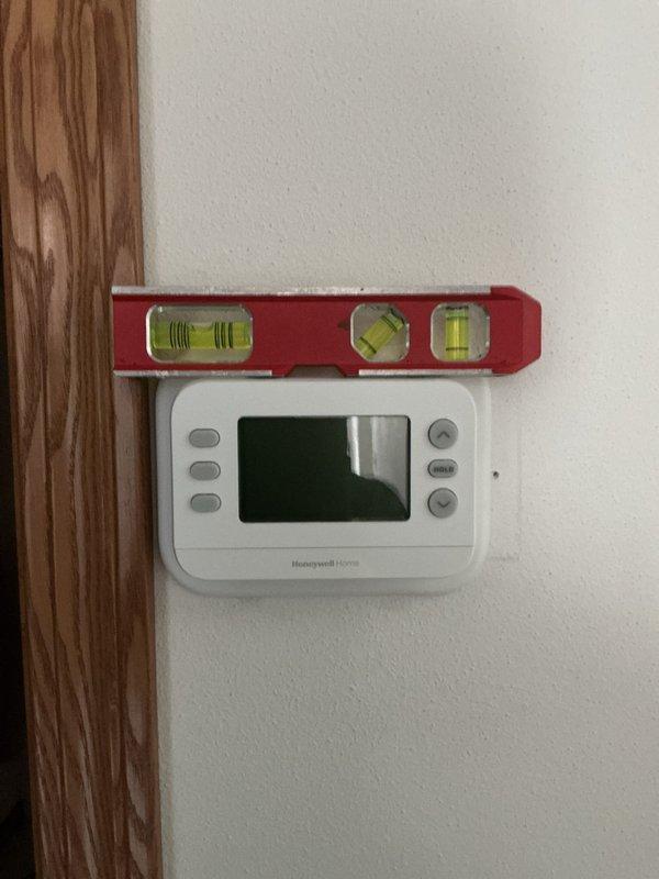 Responded to customer call regarding intermittent furnace startup issues and system failure. Diagnostic testing revealed faulty thermostat. Removed existing Honeywell unit, installed and properly leveled new replacement thermostat, and performed complete furnace cleaning and operational check. System now functioning correctly.