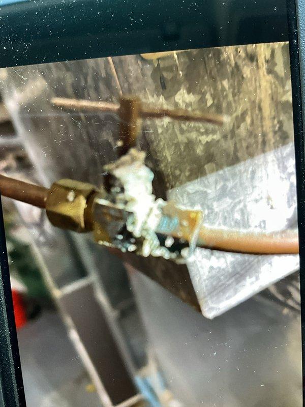 Responded to service call for leaking furnace humidifier. Diagnosed plugged drain as the root cause of the leak. Performed thorough cleaning of two humidifier units and installed one replacement pad to restore proper system function.