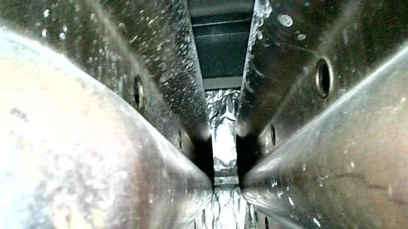Diagnosed furnace with no heat output due to failed inducer motor and cracked heat exchanger. Visual inspection revealed significant moisture accumulation and corrosion on heat exchanger surfaces, confirming split exchanger failure. Provided homeowner with new furnace replacement options as repair is not economically viable due to safety concerns.