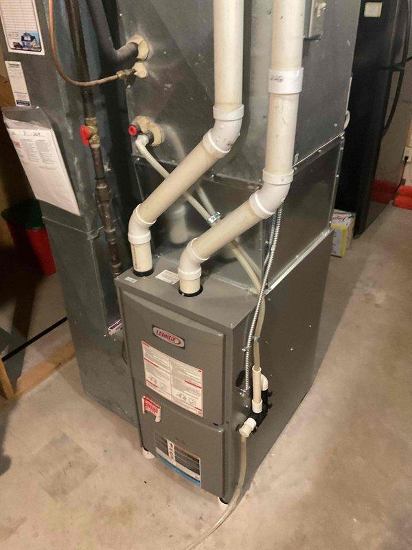 Responded to no-heat call at residential property. Diagnosed faulty thermostat as root cause of heating failure. Removed defective unit and installed new thermostat, restoring proper heat function to Lennox furnace system.