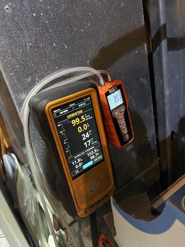 Performed clean and check service on furnace and gas line in response to reported gas odor in kitchen. Conducted combustion analysis with digital analyzer showing 99.5% efficiency reading. Temperature measurements taken with Klein Tools digital thermometers confirmed proper operation parameters. No gas leak detected; system functioning normally after service.